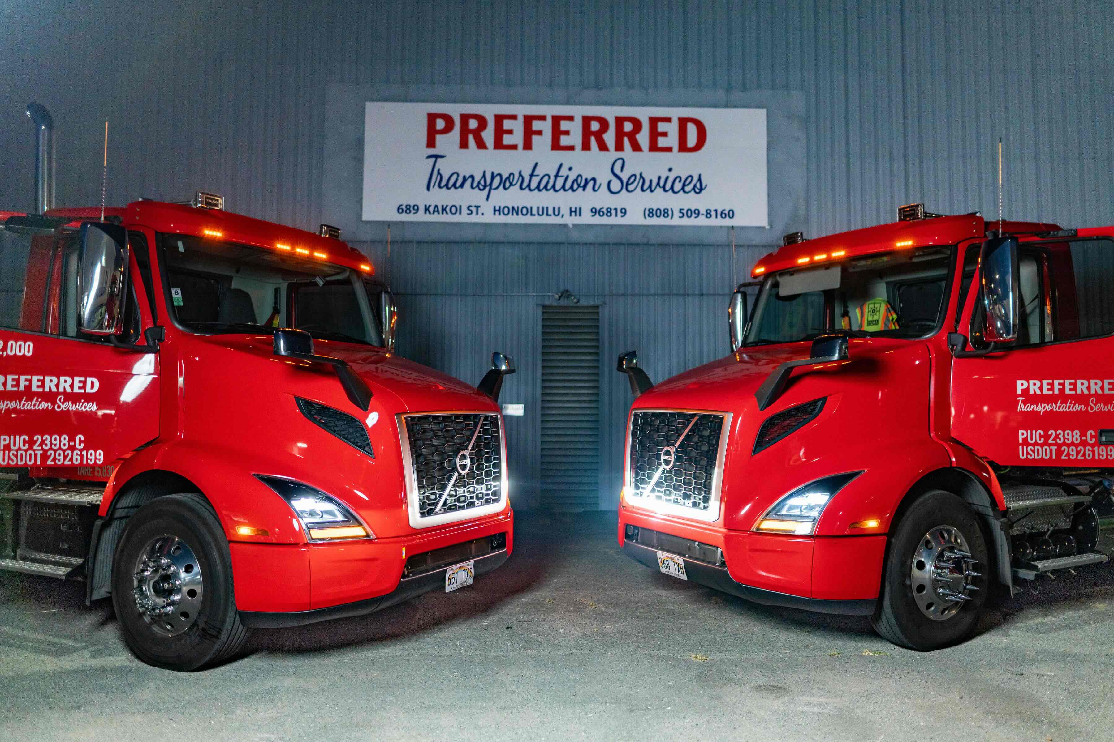 Preferred Transportation Services trucks at the Honolulu warehouse