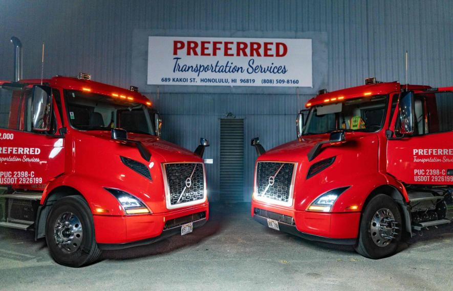 Preferred Transportation Services trucks at the Honolulu warehouse